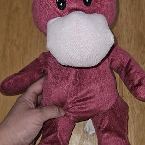 Plush Pink Dinosaur Toy